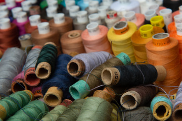 group of multicolored threads top view