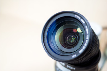 lens digital camera, selective focus, close-up, side with reflection, bokeh, isolated on white background