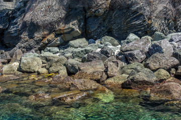 Italy, Cinque Terre, Monterosso, HIGH ANGLE VIEW OF ROCK FORMATION IN SEA