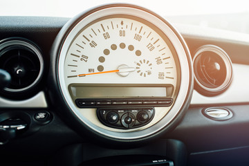 Modern car Interior - steering wheel, shift lever and dashboard.
