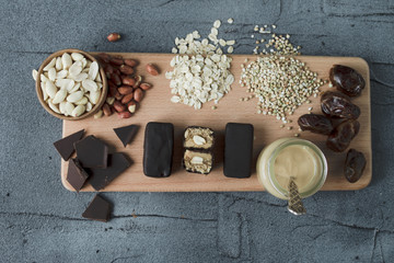 Homemade snickers bar without sugar. raw vegan sweets with ingredients