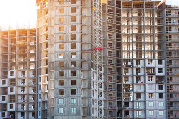 Residential building under construction, a view near the walls and windows floors