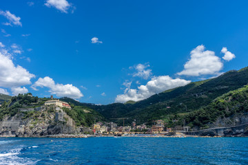 Obraz premium Italy, Cinque Terre, Monterosso, a large body of water with a mountain in the background