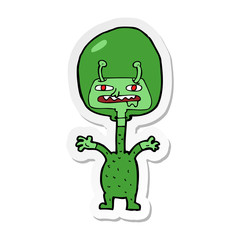 sticker of a cartoon space alien
