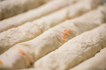 Preparation of pumpkin and apple pie with phyllo crust.