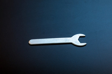 wrench on black background