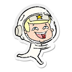 distressed sticker of a cartoon laughing astronaut