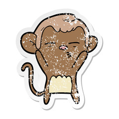 distressed sticker of a cartoon suspicious monkey