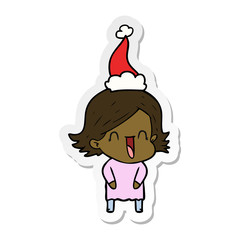 sticker cartoon of a laughing woman wearing santa hat