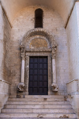 Fototapeta na wymiar Bari, Puglia, Italy - Entrance door of The Basilica of Saint Nicholas ( San Nicola ) in Bari, Roman Catholic Church in region of Apulia
