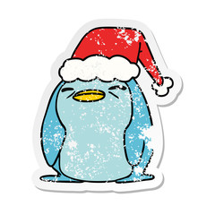 christmas distressed sticker cartoon of kawaii penguin