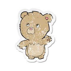 retro distressed sticker of a cartoon teddy bear