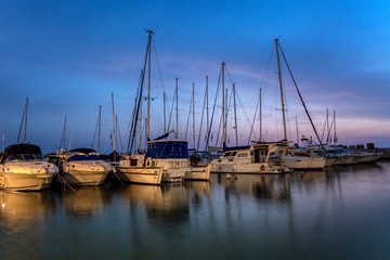 Fototapeta na wymiar Old jaffa port boats view background.