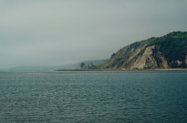 dramatic scene rocky sea shore