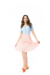 Naklejka premium pretty cheerful elegant girl posing isolated on white