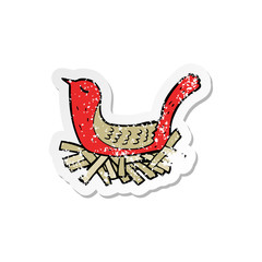 retro distressed sticker of a cartoon bird on nest