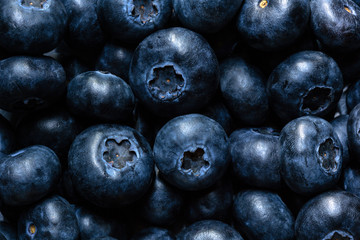 Close up, top view of yummy blueberries with a moody feel