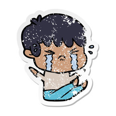 distressed sticker of a cartoon boy crying