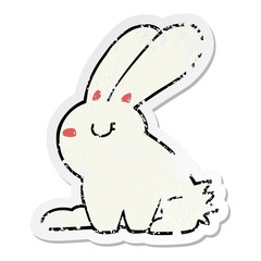 distressed sticker of a cartoon rabbit