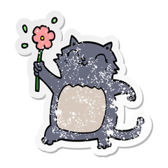 distressed sticker of a cartoon cat with flower
