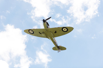 WW2 Supermarine spitfire RAF fighter plane flys during an air display airshow WWII