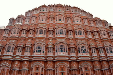 Low angle shot of facade of Hawa Mahal. Constructed with red and pink sandstone, the structure was built in 1799 by Maharaja Sawai Pratap Singh  in Jaipur, Rajasthan, India.