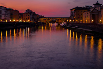 Fototapeta premium florence,tuscany/Italy 20 february 2019 : the ponte vechio bridge snapshot taken at golden hour beautiful colors and excellent architecture