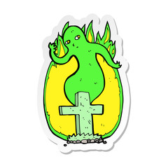 sticker of a cartoon ghost rising from grave