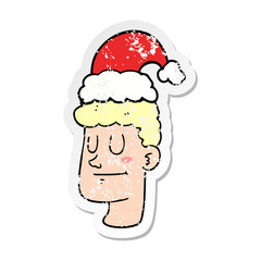 distressed sticker of a cartoon man wearing christmas hat