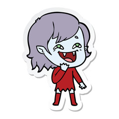 sticker of a cartoon laughing vampire girl