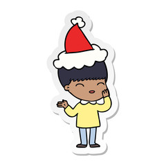 happy sticker cartoon of a boy wearing santa hat