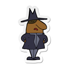 sticker of a cartoon man in coat and hat