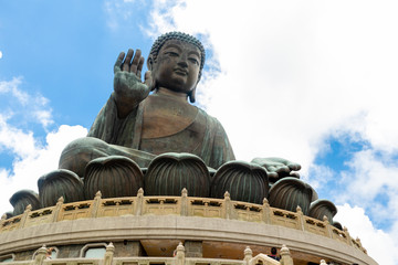 Fototapeta premium Tian Tan Buddha, Big Budda, The enormous Tian Tan Buddha at Po Lin Monastery in Hong Kong. The world's tallest outdoor seated bronze Buddha located in Ngong ping 360.