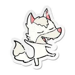 distressed sticker of a cartoon wolf laughing