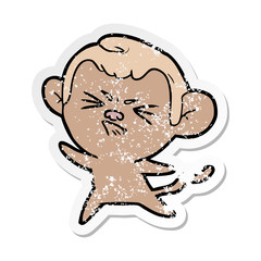 distressed sticker of a cartoon angry monkey