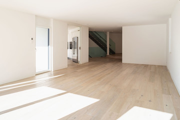 Empty white living room interior with parquet