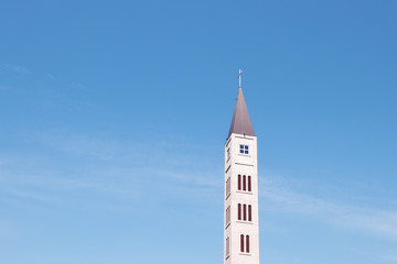 Fototapeta na wymiar Vertical image of Mostar Peace Bell Tower (Mostarski Zvonik Mira) in Bosnia and Herzegovina made from the bottom up. - Image