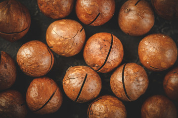 Macadamia nuts on wooden table