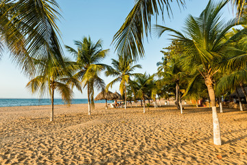 Cumana, Venezuela- March 12, 2016: People enjoying the beach during a sunset