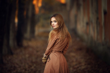 Young female model in autumn park