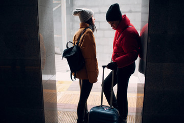 Young female and railway train.