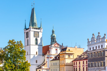 White tower of All Saints Church near main Peace square, Litomerice, Czech Republic