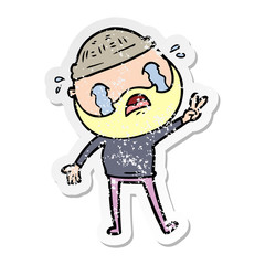 distressed sticker of a cartoon bearded man crying