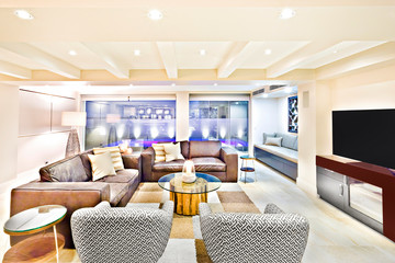 Luxury furniture with television and lamps.