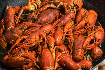 boiled crayfish on an iron plate.