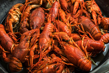 boiled crayfish on an iron plate.
