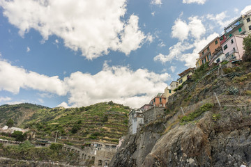 Fototapeta na wymiar Italy, Cinque Terre, Monterosso, a train on a rocky hill