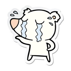 sticker of a cartoon crying polar bear