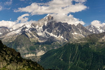 Naklejka na ściany i meble Alps in June. View of the Mont Blanc massif.