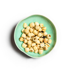 lotus nut in a bowl isolated on white background.
